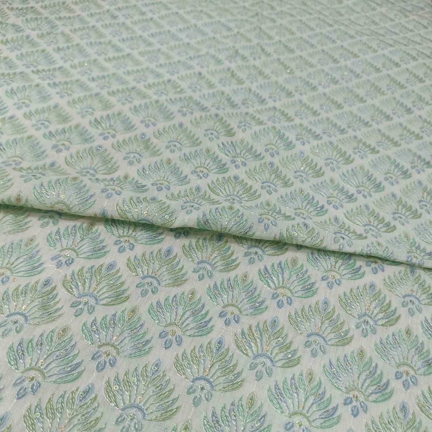 <b>Linen Embroidery with Subtle Greenish Blue Sequin Work </b>